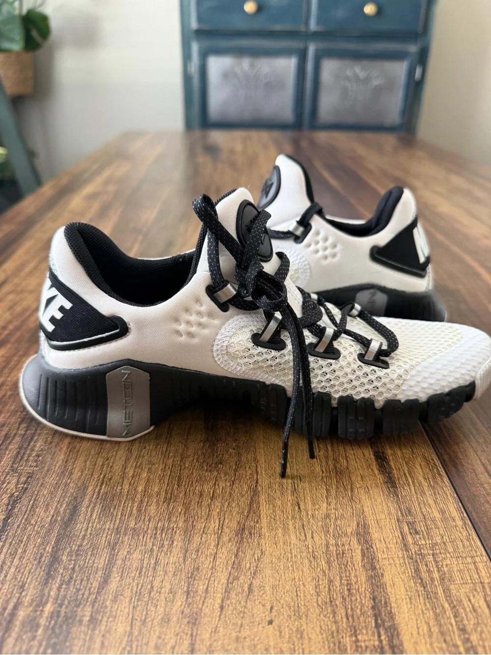 Nike Women's Metcon Sneakers in White and Black